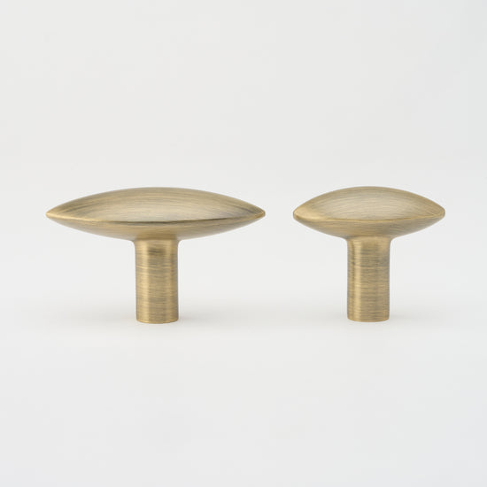 Almond Knob Aged Brass in Aged Brass