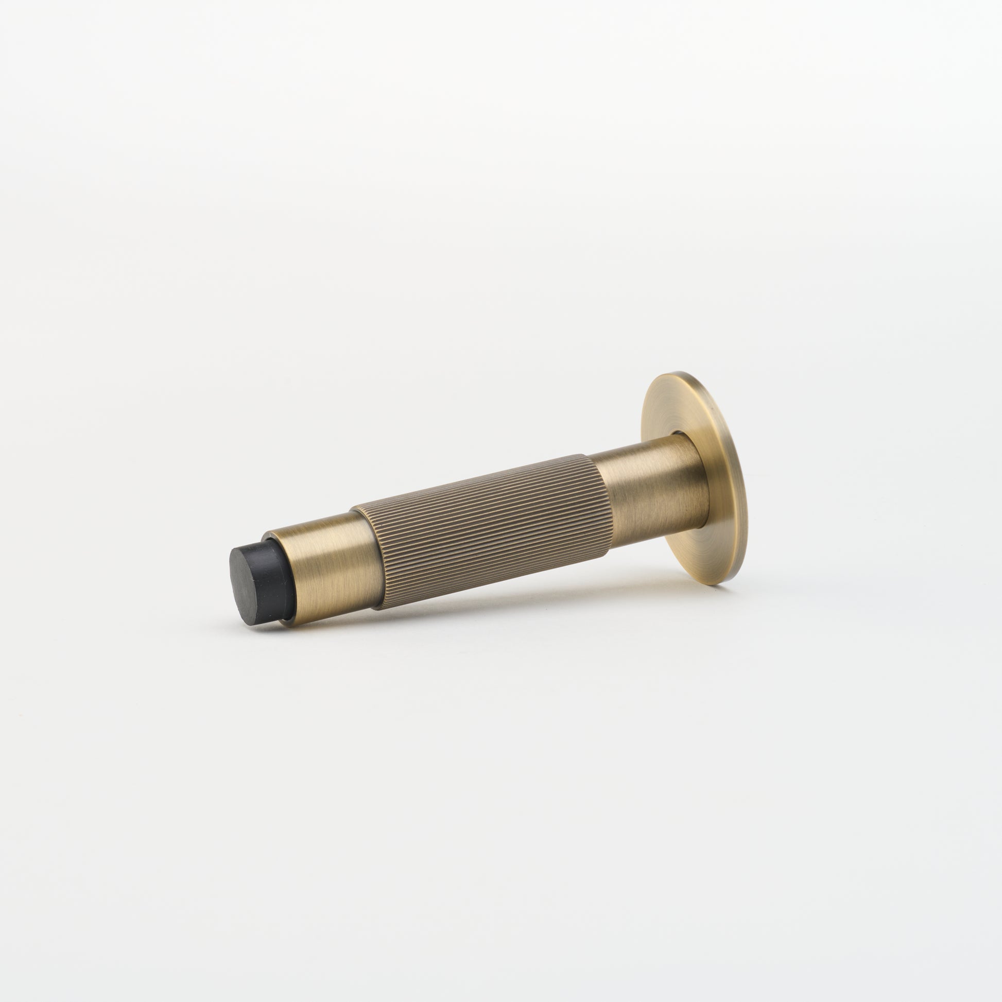 Lo & Co Linear Doorstop in Aged Brass