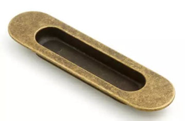 Castella Flush Sliding Door Pull - Antique Brass / H150mm x W40mm in Antique Brass