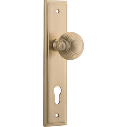 Door Knob Guildford Stepped Euro Brushed Brass CTC85mm H237xW50xP60mm in Brushed Brass