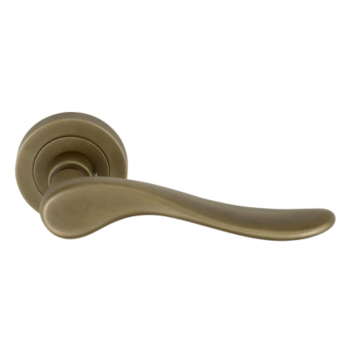 Haven 52mm Round Rose Lever Set in Roman Brass